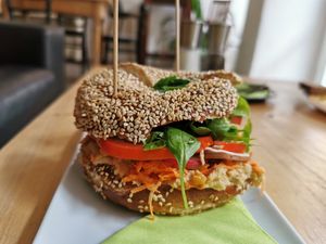 Bagel with hummus and fresh salad at Cafe Leander in Bamberg