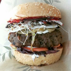 Homemade Seitan burger with grilled onions at La Pause Verte in Aubenas