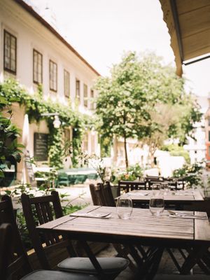 Outdoor dining area at TIAN Bistro am Spittelberg in Vienna