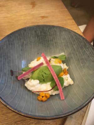 Vegan coconut rice pudding with basil herb ice cream at TIAN Bistro am Spittelberg in Vienna