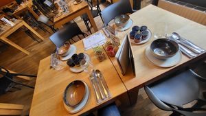 In den Gläsern am Tisch: Aufstriche at TIAN Bistro am Spittelberg in Vienna