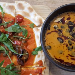 Pumpkin soup and loaded flat bread at TIAN Bistro am Spittelberg in Vienna