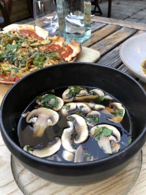 Mushroom soup and vegan flatbread at TIAN Bistro am Spittelberg in Vienna