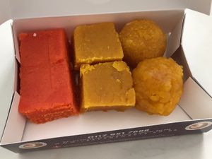 Mango barfi, besan, ladoos  at Jeevans Sweets in Bristol