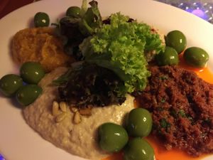 house starter for sharing - hummus, smoked tofu dip, sundries tomato dip, pumpkin dip.  at Clear Head - Lehka Hlava in Prague