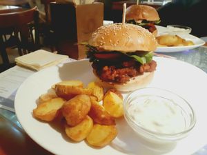 Vegan burger, potatoes and dip sauce at Clear Head - Lehka Hlava in Prague