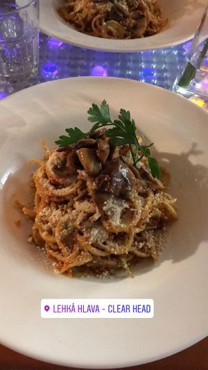 raw cucumber spaghetti with pesto of sun-dried tomatoes, fresh veggies, rice miso, marinated champignons and homemade parvegan at Clear Head - Lehka Hlava in Prague