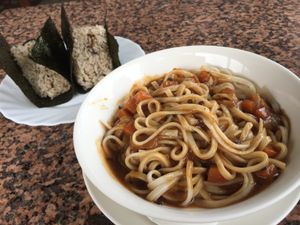Curry veg with noodles and miso onigiri. at Malibu House in Okinawa