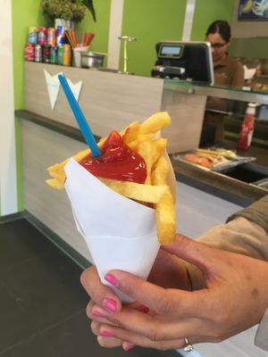 Friet! Home made french fries, freshly cut and fried in front of you with delicious local potatoes. at Vega Snacks in Hilversum