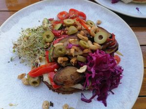 Panpizza made from chickpea flour, so delicious!! at De Herbivoor in Groningen