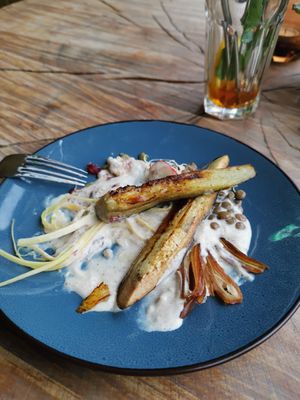 Half eaten masala yoghurt with aubergine++ at De Herbivoor in Groningen