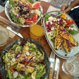 Mixed salads with mini burger patties & black beans/aubergine/tofu at De Herbivoor in Groningen