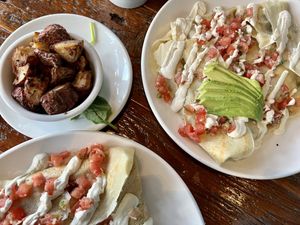 Mexican breakfast with added black beans and avocado. Side of rosemary potatoes   at Beerline Cafe in Milwaukee