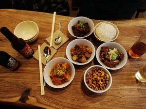 Drinks and small bowls - nuts, tofu, tempeh dishes at The Hug and Pint in Glasgow