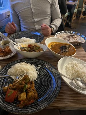 Saucy aubergine curry to the right   at Indian Temptation in Bath