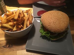 Vegan burger number 2 with veggie patty and a curry sauce + very good fries at BioBurgerMeister in Salzburg