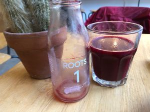 Red beet, apple, carrot, lemon and mint juice at ROOTS - Amstelveenseweg in Amsterdam