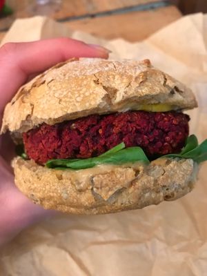 Beet burger with roasted pumpkin and tahini dressing at ROOTS - Amstelveenseweg in Amsterdam