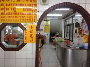entrance to the seating area. You can select your dim sum from the outside area, then pay at the counter and bring your plate inside to eat. There is upstairs/ downstairs seating at Qīng Qí SùShí in Tainan