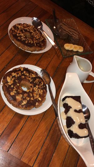vegan donuts, raw chocolate brownie and orange chocolate cake  at Alkaline Restaurant in Canggu