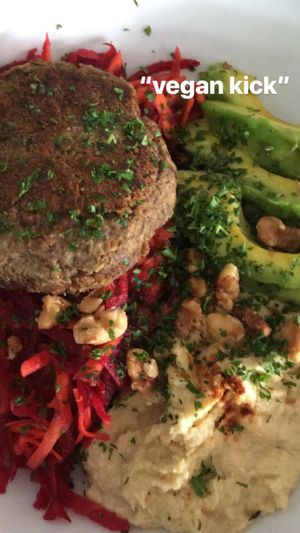 The "Vegan Kick": lentil patty; grated beetroot and carrot; hummus; avocado; walnuts; tomato relish at Motion Cafe in Canggu