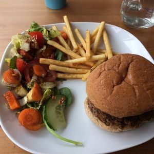 Curry-burger with salad and fries. at The Green Room in Warrington