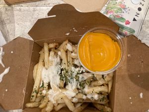 Garlic fries w a side of cheese at VeganBurg in San Francisco