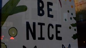 be nice and eat veggies sign at VeganBurg in San Francisco