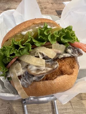 Creamy mushroom burger with pickles and bacon added   at VeganBurg in San Francisco