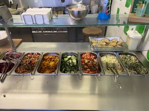 You make the pita yourself! at Maoz - Albertcuypstraat in Amsterdam