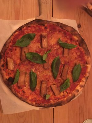 Vegan pizza with extra tofu sausages at In Bocca Al Lupo in Lisbon