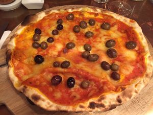 vegan cheese pizza with olives  at In Bocca Al Lupo in Lisbon