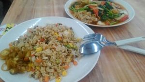 fried rice and hor fun in the background  at New Realm 素林 in Central Singapore