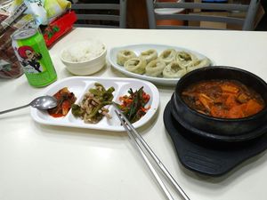 steamed dumplings and kimchi and spicy sausage stew at SaRangBunSik - 사랑분식 in Seoul