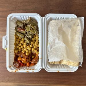 Small Boxed Meal with Split Pea Roti base, Curry Chickpeas, Okra Stew and Spareribs BBQ  at Ital Vital in Scarborough