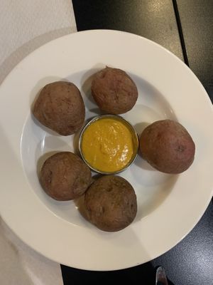 Papas “canarias”. Es curry  at The Mantraa in Barcelona