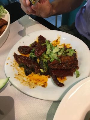 Sundried tomatoes with chilli, sesame, lemon and garlic)  at The Mantraa in Barcelona