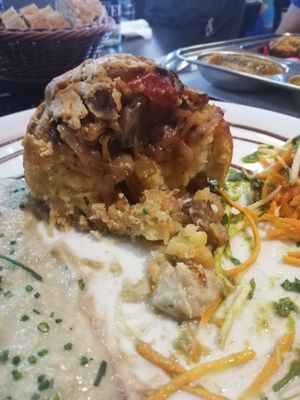 Niu de patata i xampinyons obert at The Mantraa in Barcelona