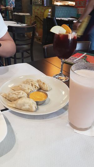 Amazing momo's!! ❤️ And yumyum milkshake. at The Mantraa in Barcelona