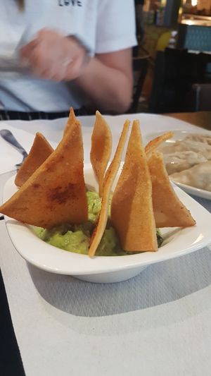 Guacamole with Indian nachos, very tasty at The Mantraa in Barcelona