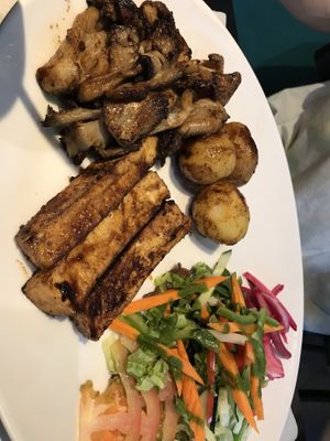 mushrooms, potato’s and tofu  at The Mantraa in Barcelona