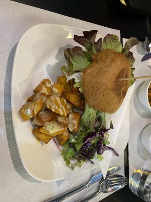 Seitan burger and patatas bravas !  at The Mantraa in Barcelona