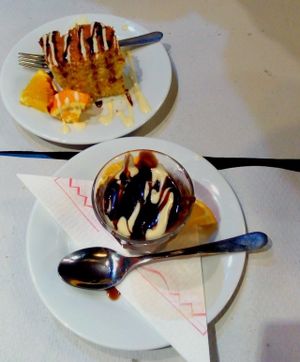 Dessert of the menu with 2 courses, dessert, bread and wine for 8, 50€  - an apple cake and chocolate cream at The Mantraa in Barcelona