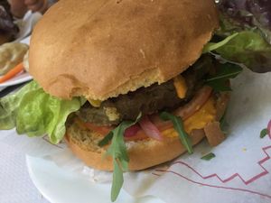 Tofu burger with peanut sauce  at The Mantraa in Barcelona