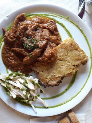 Estopad de seitan y girgola con tarta de patata y ensalada at The Mantraa in Barcelona