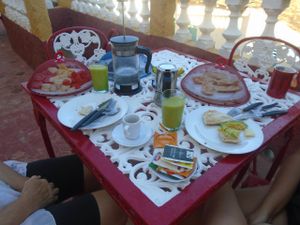 Another vegan breakfast featuring fresh banana bread, avocado and ginger smoothies, fresh fruits and avocado toasties..... at Casa El Delfin in Trinidad