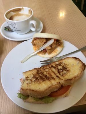 Two pintxos and a cafe con leche de avena  at Crock and cock in Bilbao
