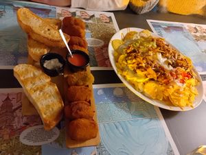 Croquetas varias y super nachos at Crock and cock in Bilbao