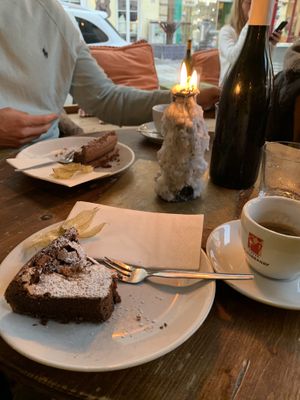 Vegan chocolate cake. Nice coffee, always served with big wine bottle, filled with water. at 7Stern in Vienna