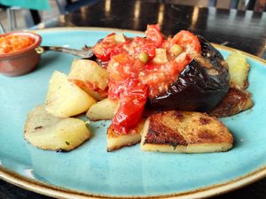 IMAM BAYILDI: potatos, tomatoes, eggplant with ajvar sauce. at Food House in Mostar